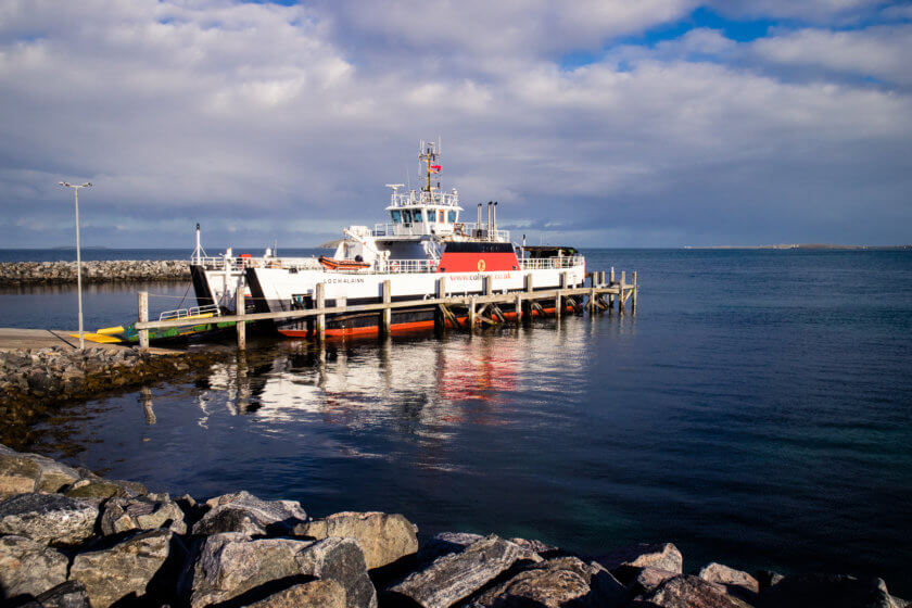 A CalMac ferry in the port of Eriskay.